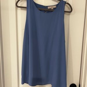 Sleeveless top with pretty back ruffle details
